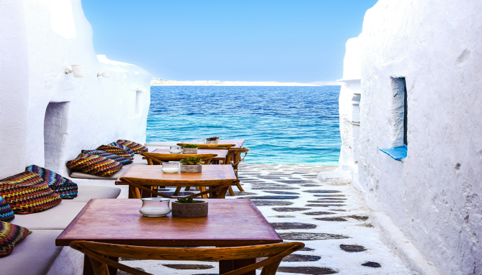 Beautiful Mykonos backstreet looking over the sea